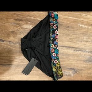 Woman’s black bottoms